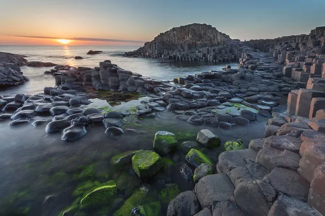 Sunset over basalt columns of Giant's Causeway